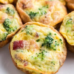 Close up baked egg muffin with broccoli and bacon