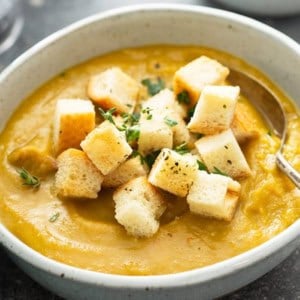 bowl of split pea soup recipe with croutons on top