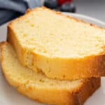 2 slices of pound cake stacked on white plate