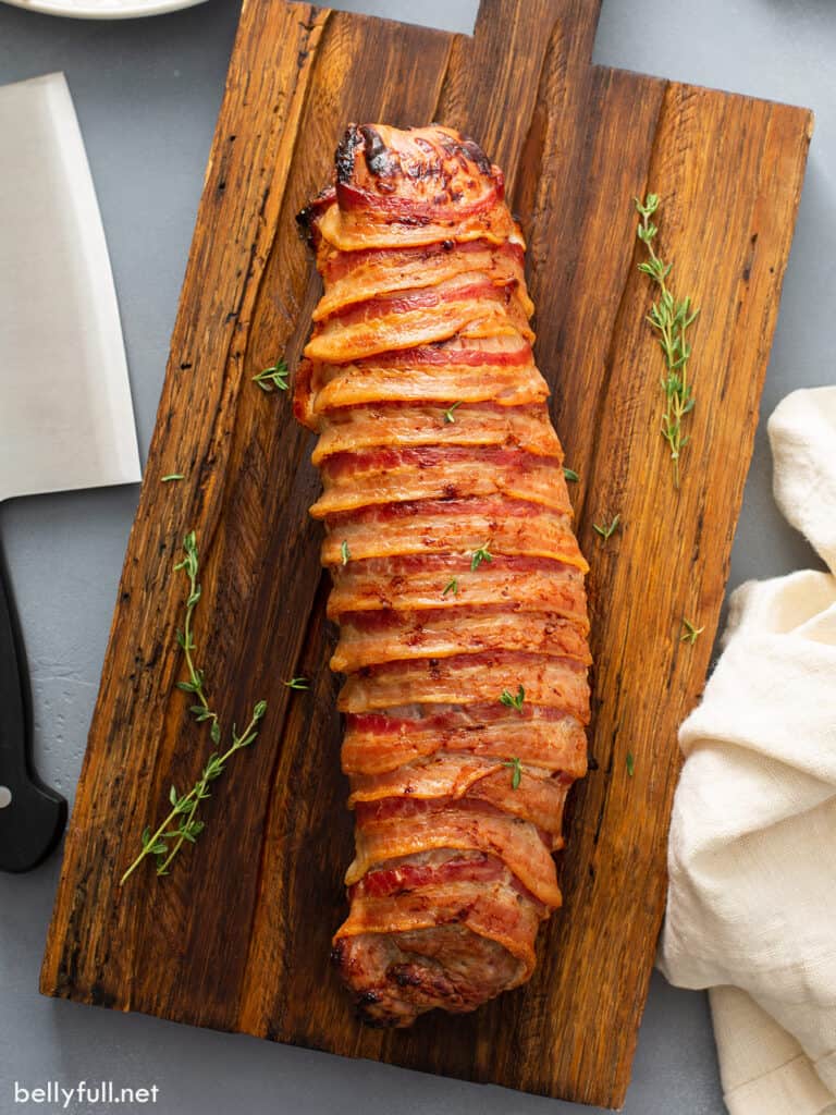 overhead whole roasted pork tenderloin wrapped in bacon