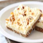 eggnog cheesecake bars on plate