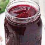 sliced pickled beets at the top of a jar