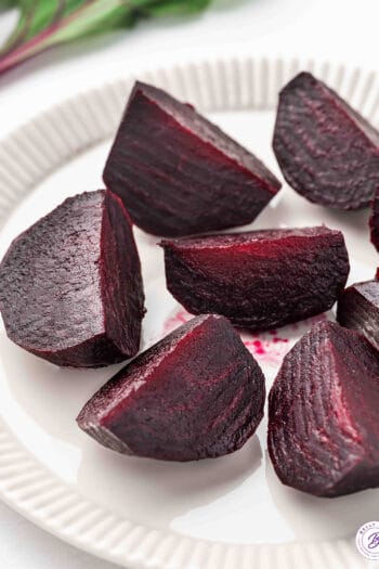roasted beets cut into wedges on plate