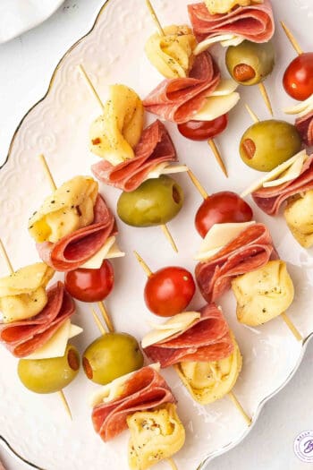 Mini Tortellini Kabobs with salami, cherry tomatoes, and cheese on party skewers